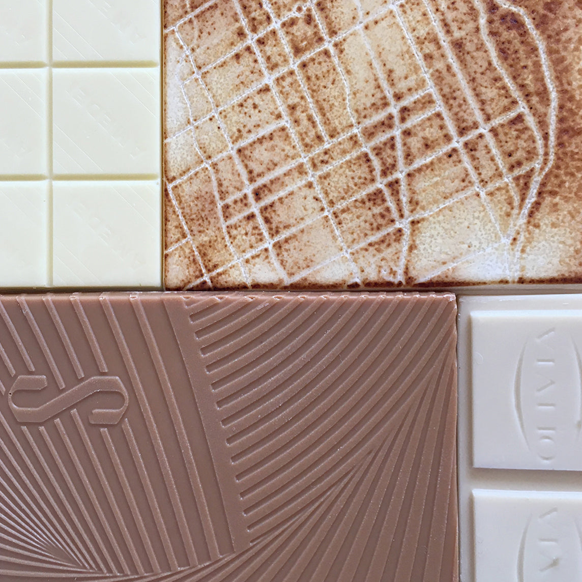 4 bars of white, bean to bar chocolate available in Ottawa from JoJo CoCo